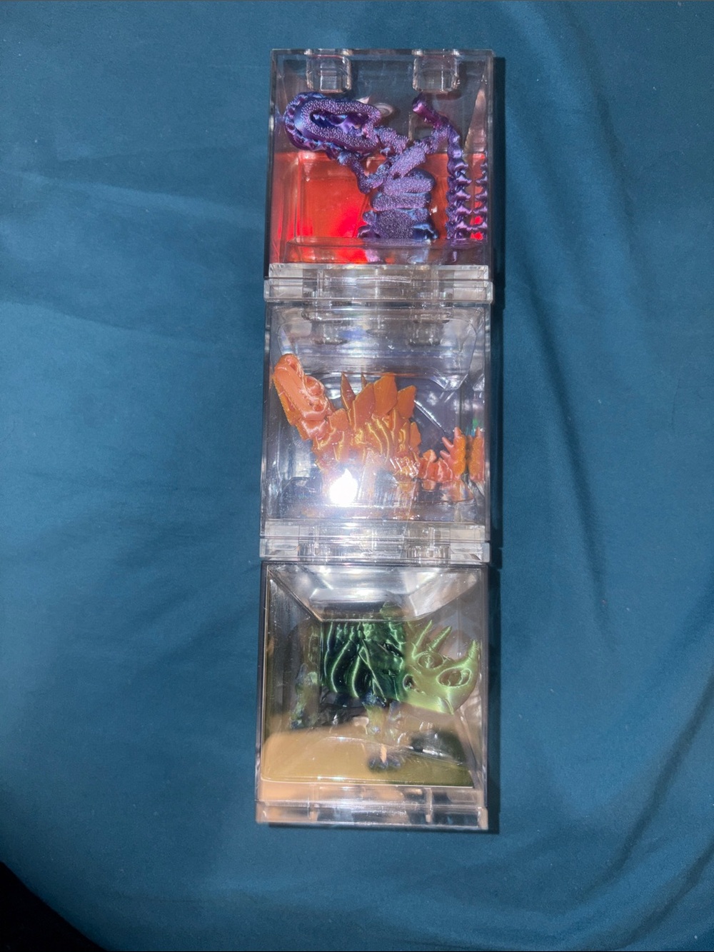 Stackable Clear Cube Dinosaur Toy Set - Blue, Orange, Green these are 3-D dinosa